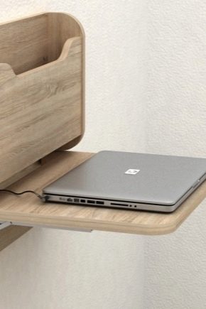Wall-mounted folding tables
