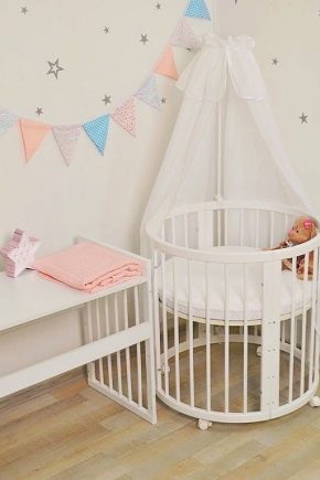 Wählen Sie ein rundes Kinderbett für Neugeborene