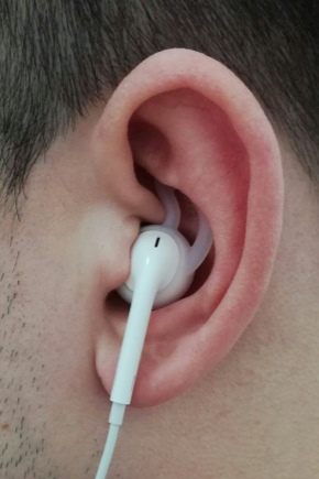Wat te doen als een koptelefoon uit mijn oren valt?