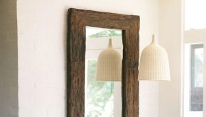 Mirror with a shelf in the hallway: placement features
