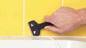 How to scrub the silicone sealant off the tile?
