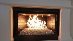 How to choose a fireplace with glass?
