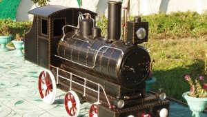 Kohlenbecken in Form einer Dampflokomotive: ein originelles Design auf Ihrer Website