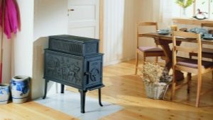 Cast iron fireplace stove in the interior