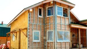 The subtleties of insulating wooden houses outside