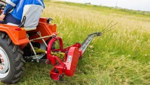 Tipuri și subtilități ale alegerii unei mașini de tuns iarbă pentru un mini-tractor