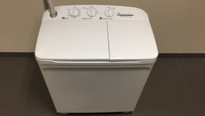 Halfautomatische wasmachines met centrifugeren: kenmerken, selectie, bediening en reparatie