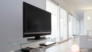 All about glass TV stands
