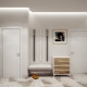 White hallway: the advantages of light colors in the interior