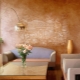 Wallpaper with the effect of decorative plaster in the interior