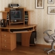 What are the advantages and disadvantages of a small corner computer desk?