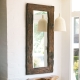 Mirror with a shelf in the hallway: placement features