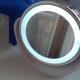 Illuminated magnifying mirror