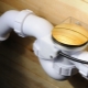 How does the automatic bathtub drain and overflow system work?