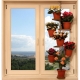 ¿Cómo elegir un estante para flores en el alféizar de una ventana?
