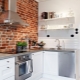 Brick wall in the kitchen: features and interesting options