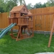 Choosing a children's play complex with a slide for a summer residence