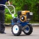 Adapters for the Neva walk-behind tractor: characteristics and application features