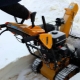 Characteristics and features of tracked snow blowers