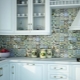 Tiles for the kitchen on the apron: features, types and styling options