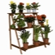 Varieties and selection of wooden floor stands for flowers