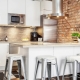 Secrets of decorating a small kitchen in the loft style