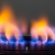 Why does the gas on the stove burn orange, red or yellow?