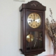 Wall clock with a pendulum: types and use in the interior