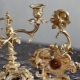 Candlesticks made of bronze and brass: overview of types and tips for care