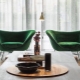 Green armchairs in the interior