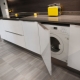 Built-in washing machine in the kitchen: pros, cons and choices