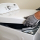 How are top-loading washing machines repaired?
