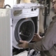 How is the cuff replaced on an LG washing machine?