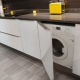 台面下的嵌入式洗衣机：特点，品种和安装 
