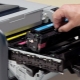 Refilling cartridges for laser printers