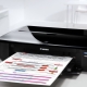 Why does a Canon printer print in stripes and what should I do?
