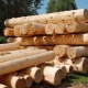 What is round timber and where is it used?