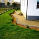 Blind area with paving slabs around the house