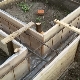 We make formwork from planks for the foundation with our own hands